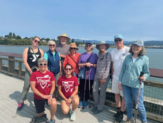 Active Older Adults and Y staff on a walk on the pier